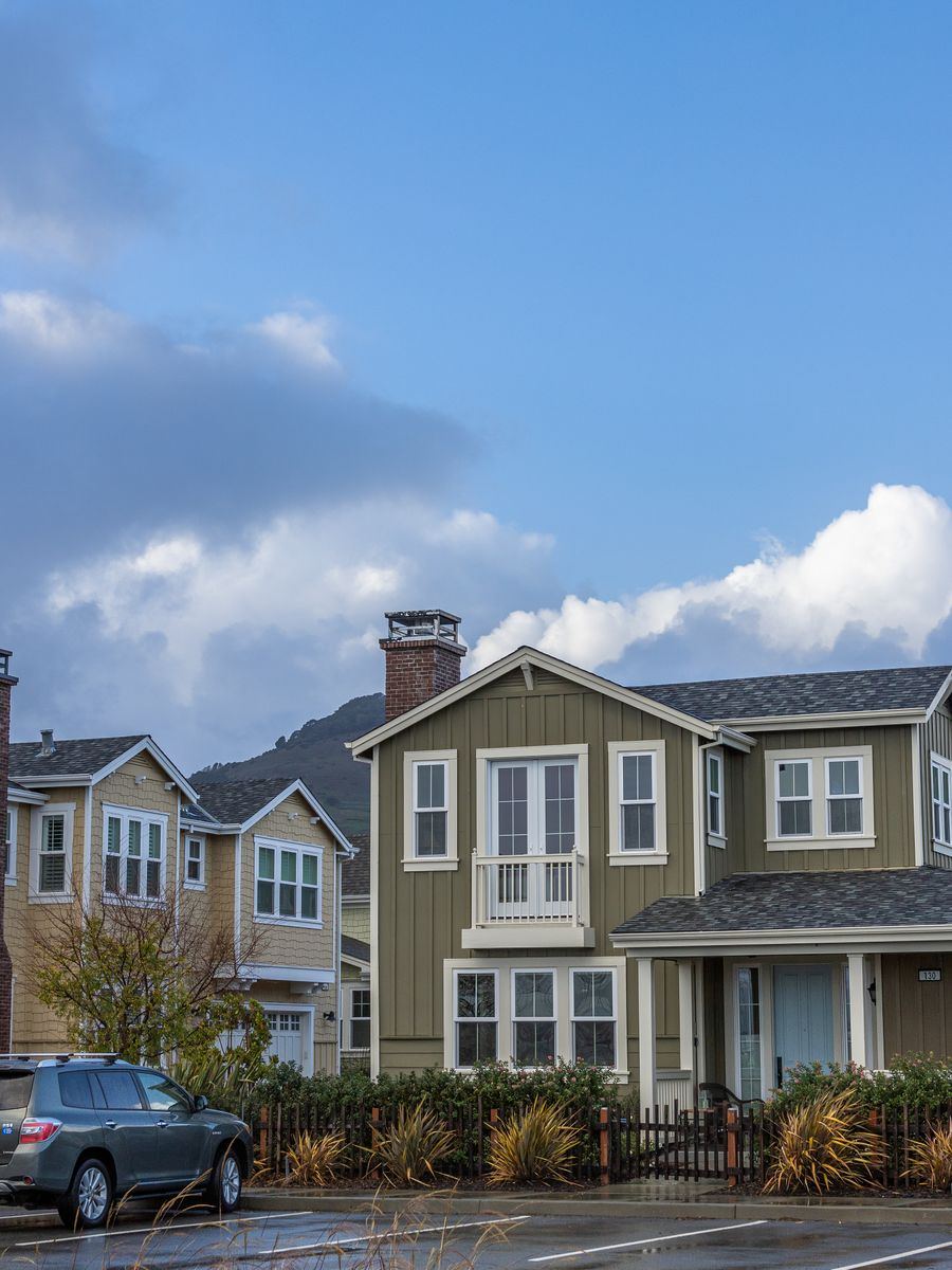 A residential street of homes in a suburban neighborhood